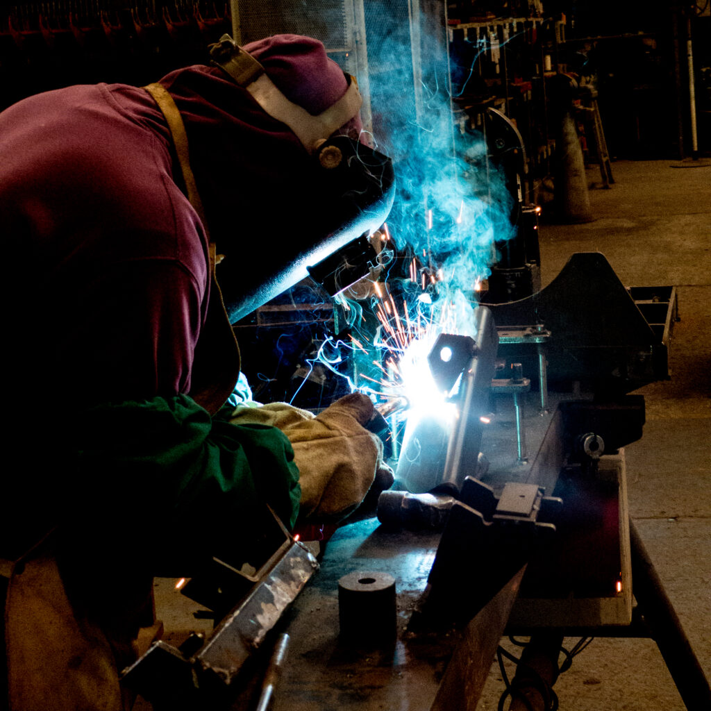 side-view-man-working-factory